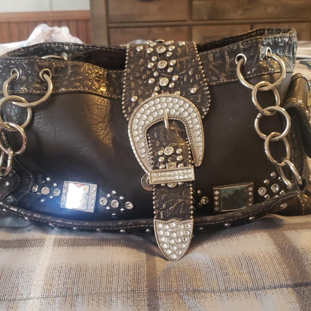 Western style purse with gun pocket